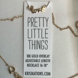 Kris Nations “Love” Gold Necklace